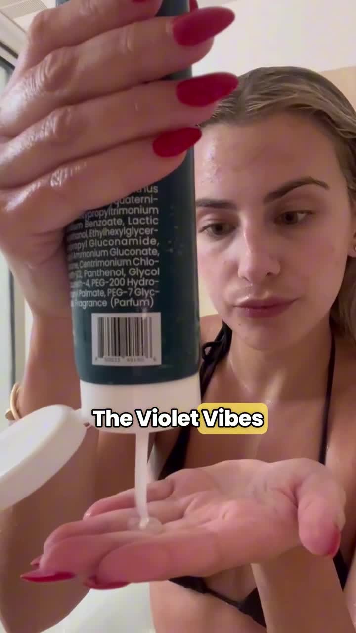 Dispensing Violet Vibes cleansing shampoo in the shower